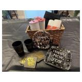 Basket, paper plates, napkins, mesh ribbon