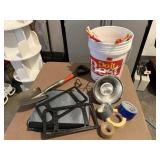 Bucket, clamp work light, shovel, rolls of tape,