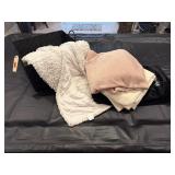 Basket of throw plankets