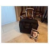 Rolling briefcase, Tim Tebow book