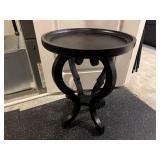Black round side table
