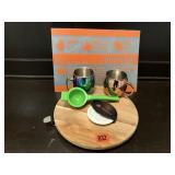 Pampered Chef lazy susan, cutting mat, mugs,