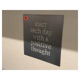 'Start Each Day With a Positive Thought' sign