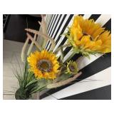 Tall sunflower stems, decorative grass, flower pot