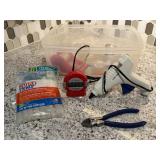 Glue gun, glue sticks, tape, timer, wire cutters