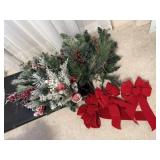 Holiday greenery, picks, bows