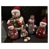 Plush snowmen collection, storage tote included