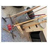 Galvanized trash can, yard tools, rakes, hoe,,