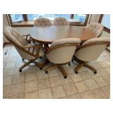Dinette set, oblong table, rolling arm chairs (6)