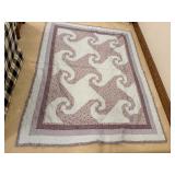 Handmade quilt, storage quilt included