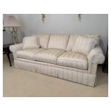 C.R. Laine cream striped sofa, throw pillows