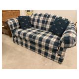 Plaid love seat, throw pillows