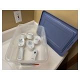 Storage tote, nightlights, outlet adapters
