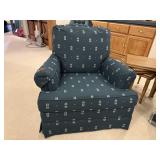 Green upholstered easy chair