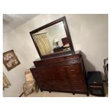 Dresser with attached mirror