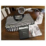 Travel bag, sketch pencils, magnifying light