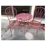 Red wrought iron patio set, table, chairs (2)