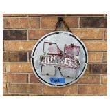 Faded Nebraska Huskers metal sign