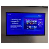 ONN Roku 32" television, remote control