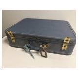 American Tourister vintage suitcase
