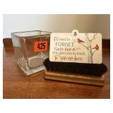 Candle holder, memory ornament, brush
