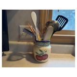 Apple crock of utensils