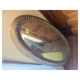 Antique oval wall mirror