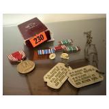 Military dog tags, medals, rank pins