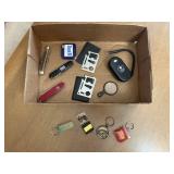 Pocket knives, tape measure, magnifying glass,