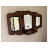 Triple pane hinged wall mirror