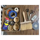 Adhesives, WD-40, hand broom, scrapers, tape