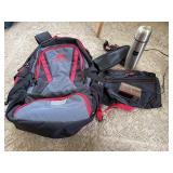 Backpack, alarm clock, drink thermos