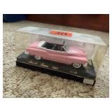 1950 Super Buick toy car, display case