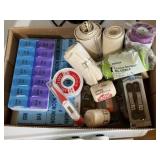 First aid supplies, prescription sorters, bandages