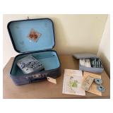 Vintage suitcase, buttonholer, Kenmore manual,