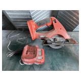 Black & Decker cordless saw, charger, no battery