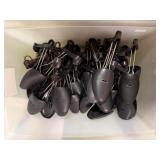 Tote of plastic shoe stretchers