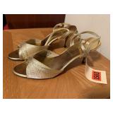 Fashionable womenï¿½s gold, high heel sandals,