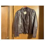 Bermanï¿½s brown leather jacket