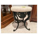Cast iron upholstered stool