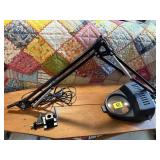 Adjustable magnifying work light