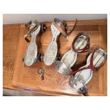 Two pairs metal roller skates, skate key