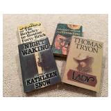 Stack of hardcover fiction books (4)