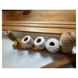 Primitive wall peg rack, spools of twine