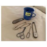 Enamel cup, pins, scissors, shoe horn
