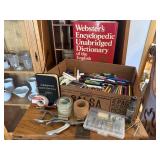 Box of office supplies, markers, colored