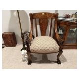 Antique lionhead, clawfoot chair