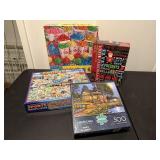 Assorted jigsaw puzzles (4)