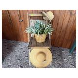 Wooden folding chair, green plant, sun hats (2)