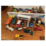 Toy cars, trucks, motorcycles, helicopters